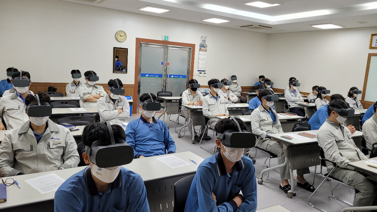 Learners experiencing VR together in a classroom